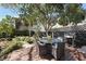 Charming backyard deck area with dining set and lush landscaping at 99 Logan St, Charleston, SC 29401