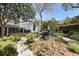 A private backyard features outdoor seating and lush landscaping at 99 Logan St, Charleston, SC 29401