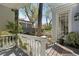 A backyard view from the porch showing the outdoor space and manicured lawn at 99 Logan St, Charleston, SC 29401