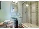 Elegant bathroom featuring a modern glass shower and a stylish vessel sink at 99 Logan St, Charleston, SC 29401