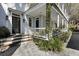 Beautiful front porch with lush greenery at 99 Logan St, Charleston, SC 29401