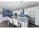Beautiful kitchen with a large island with granite countertops and stainless steel appliances at 99 Logan St, Charleston, SC 29401
