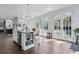 Stylish kitchen featuring granite countertops, stainless appliances, and a center island with convenient storage at 99 Logan St, Charleston, SC 29401