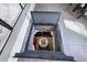 Unique wine cellar showcasing a charming round table with floral arrangement at 99 Logan St, Charleston, SC 29401