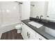 Bathroom featuring a modern vanity with dark countertop and a shower and bathtub at 103 Rosa Gray Ln, Goose Creek, SC 29445