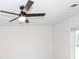 Bright bedroom with a ceiling fan, neutral walls, and a window offering natural light at 103 Rosa Gray Ln, Goose Creek, SC 29445