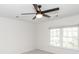 Bedroom featuring a ceiling fan, window and neutral carpet and walls at 103 Rosa Gray Ln, Goose Creek, SC 29445