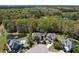 Aerial view of multiple homes interspersed with lakes and green trees at 1067 Shipton Ct, Charleston, SC 29414