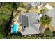 Aerial view of a beautiful home with solar panels and a blue pool at 1067 Shipton Ct, Charleston, SC 29414