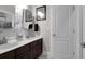 Bathroom featuring double sinks, modern lighting, and framed wall art at 1067 Shipton Ct, Charleston, SC 29414