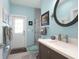 Charming bathroom boasts a shower, vanity with sink, and stylish décor at 1067 Shipton Ct, Charleston, SC 29414