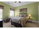 Comfortable bedroom featuring a ceiling fan and a sun-filled window at 1067 Shipton Ct, Charleston, SC 29414