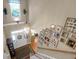 Bright foyer boasts a high ceiling, chandelier, hardwood floors, staircase, and gallery wall at 1067 Shipton Ct, Charleston, SC 29414