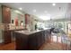 Gourmet kitchen with an island, granite countertops, stainless steel appliances, and open floor plan at 1067 Shipton Ct, Charleston, SC 29414
