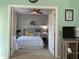 Comfortable bedroom features a ceiling fan and a soft inviting blue bed at 111 Spanish Oak Ln, Ladson, SC 29456