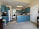 Bright kitchen with painted cabinets, appliances, and convenient access to the adjacent room at 111 Spanish Oak Ln, Ladson, SC 29456