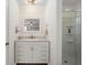 Beautiful bathroom with white plank accent wall, granite counters, and a shower at 112 Lois Cir, Moncks Corner, SC 29461