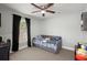 Small bedroom features a daybed, window with natural light, and plush toys at 112 Lois Cir, Moncks Corner, SC 29461