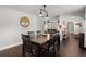 Dining room features dark wood table, hardwood floors, and a stylish chandelier at 112 Lois Cir, Moncks Corner, SC 29461