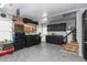 The garage space offers a custom workbench, storage cabinets, and epoxy flooring at 112 Lois Cir, Moncks Corner, SC 29461
