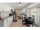 Modern kitchen with white cabinets, granite countertops, and stainless steel appliances at 112 Lois Cir, Moncks Corner, SC 29461