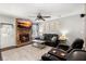 Comfortable living room features a brick fireplace and plush seating for relaxation at 112 Lois Cir, Moncks Corner, SC 29461