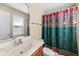 Charming bathroom with elegant vanity and colorful shower curtain, providing comfort at 1124 Clearspring Dr, Charleston, SC 29412