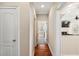 Hallway with hardwood floors leading to the living room at 1124 Clearspring Dr, Charleston, SC 29412