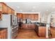 Spacious kitchen with stainless steel appliances, wooden cabinets, and an open layout at 1124 Clearspring Dr, Charleston, SC 29412
