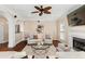 An airy living room with modern decor, fireplace, and hardwood floors at 1124 Clearspring Dr, Charleston, SC 29412