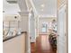 Bright living room with hardwood floors, arched doorways, and lots of natural light at 1124 Clearspring Dr, Charleston, SC 29412