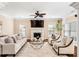 Inviting living room featuring a fireplace, hardwood floors, and neutral decor at 1124 Clearspring Dr, Charleston, SC 29412