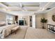 Spacious main bedroom with fireplace, sitting area, and ensuite bathroom, creating a luxurious retreat at 1124 Clearspring Dr, Charleston, SC 29412