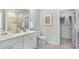 Well-lit bathroom with double sinks, and modern fixtures with a neutral color palette at 114 Snow St, Summerville, SC 29486