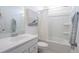 Modern bathroom with a shower-tub combo, a sleek vanity, and light fixtures at 114 Snow St, Summerville, SC 29486