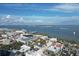 An aerial view showcases the stunning waterfront, historic architecture, and the Ravenel Bridge in Charleston at 12 Elliott St # A, Charleston, SC 29401