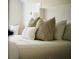 Bedroom with a soft bed and decorative pillows at 12 Elliott St # A, Charleston, SC 29401