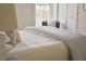 Cozy bedroom with a comfortable bed, soft pillows, and a relaxing ambiance at 12 Elliott St # A, Charleston, SC 29401