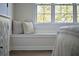 Bedroom with a window seat and natural sunlight at 12 Elliott St # A, Charleston, SC 29401