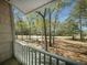 Relaxing balcony view with lush trees at 1212 Pinopolis Rd, Moncks Corner, SC 29461