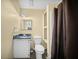 Classic bathroom with a toilet, vanity and shower at 1212 Pinopolis Rd, Moncks Corner, SC 29461