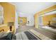 Bright Primary bedroom featuring a fireplace, walkout, and large closet at 1212 Pinopolis Rd, Moncks Corner, SC 29461