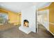 A bedroom featuring a cozy fireplace, sliding closet doors, and a view to another room at 1212 Pinopolis Rd, Moncks Corner, SC 29461