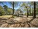 Exterior of a home with a large yard, perfect for enjoying the outdoors and entertaining guests at 1212 Pinopolis Rd, Moncks Corner, SC 29461