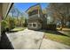 Two-story home with an outdoor balcony and a spacious driveway at 1212 Pinopolis Rd, Moncks Corner, SC 29461