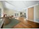 Bright living room with hardwood floors, a large window and a decorative fireplace at 1212 Pinopolis Rd, Moncks Corner, SC 29461