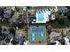 Stunning aerial view featuring a pool, tennis court, and waterfront access in a desirable community at 1213 Waterfront Dr, Mount Pleasant, SC 29464
