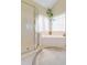 Bright and modern bathroom featuring tub, shower, and vanity area at 1213 Waterfront Dr, Mount Pleasant, SC 29464