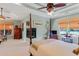 Spacious bedroom features a fireplace, tray ceilings, and four-poster bed with cozy furnishings at 1213 Waterfront Dr, Mount Pleasant, SC 29464