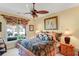 Inviting bedroom with comfortable bed, dresser, window, and ceiling fan at 1213 Waterfront Dr, Mount Pleasant, SC 29464